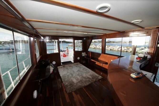 3 Hours - 53' Hatteras - Tulum, Playa Del Carmen, Riviera Maya - Drinks, paddleboards, and karaoke