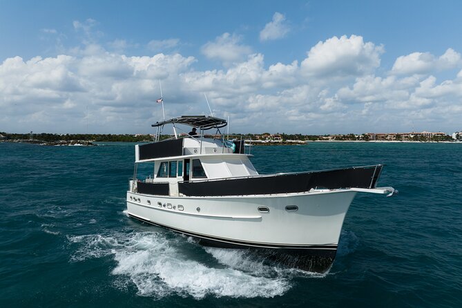 4 Hours - 53' Hatteras - Tulum, Playa Del Carmen, Riviera Maya - A private yacht day from Puerto Aventuras