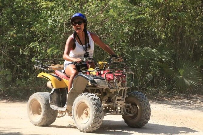 ATV Cenote and Zipline Sacred Jungle Expedition - Cooling off inside the cenote