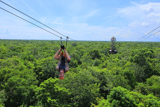 ATV Extreme and Snorkel Adventure from the Riviera Maya - Taking the zipline through the treetops