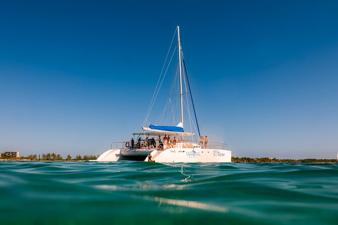 Catamaran Cruise in Riviera Maya With Snorkeling & Beach Club - What the two snorkeling stops are like