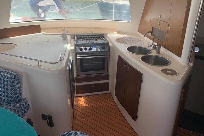 Catamaran Tour to Isla Mujeres Snorkeling with Buffet and Open Bar - Who Will Enjoy This Day Most?