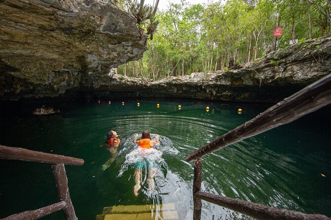 Cenote Tankah and Mayan Village Tour with Zipline, Canoes & Lunch - Clear cenotes and a full day at Tankah