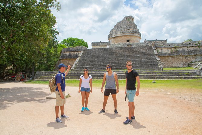 Chichen Itza by Van: Reduced Group, Tour Guide, Fast Trip & Lunch - Entering the ruins with a bilingual guide