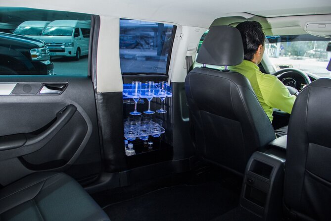 Departure by Luxury Sedan From Playa del Carmen to Cancun Airport - Drivers and the human side of the service