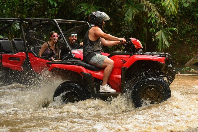 Experience in Atvs in the Mayan Jungle with Cenote and Zip Line - Riding an ATV through the jungle