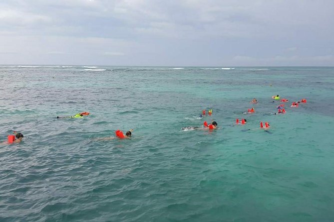 Fantastic Day Isla Mujeres Unlimited Catamaran from Riviera Maya - Sailing toward Punta Sur and the beach-club stop