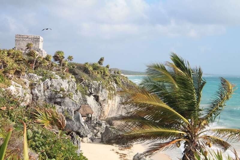 From Riviera Maya : Tulum Ruins, Cenotes & Jungle Adventure - Tulum ruins before the heat arrives