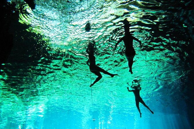 Full-dayTurtle Adventure: ATV, Zipline, Cenote & Turtle Swim - Swimming through an underground river