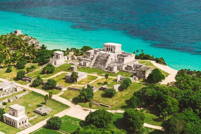 Guided Tour of Archaeological Zone of Tulum + Cenote Swim - Shared vans, pickup zones, and a long morning