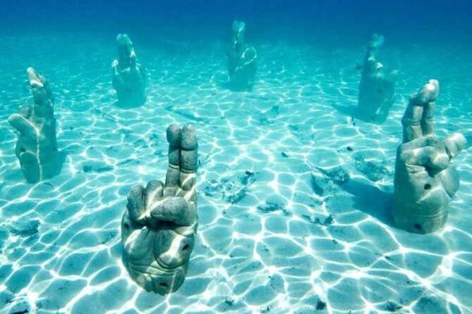 Isla Mujeres on luxury catamaran with snorkel, open bar and lunch - Who will enjoy this catamaran day?