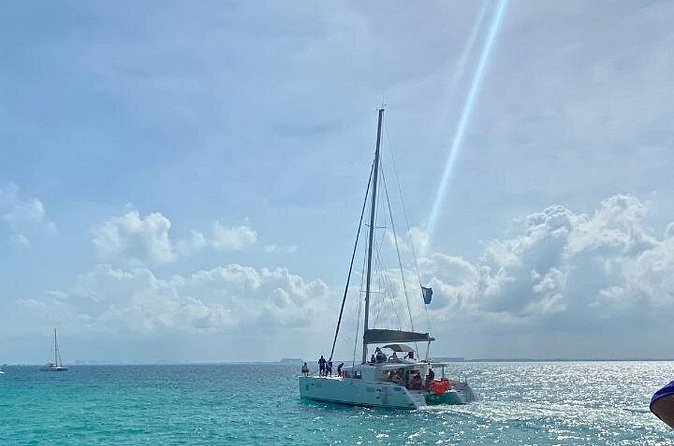 Isla Mujeres on luxury catamaran with snorkel, open bar and lunch - Booking, cancellation, and useful planning notes