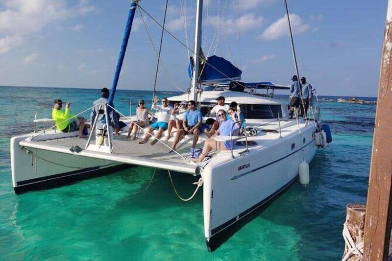 Isla Mujeres Plus Experience Catamaran Tour + Snorkel+Lunch - At the port, expect a busy start