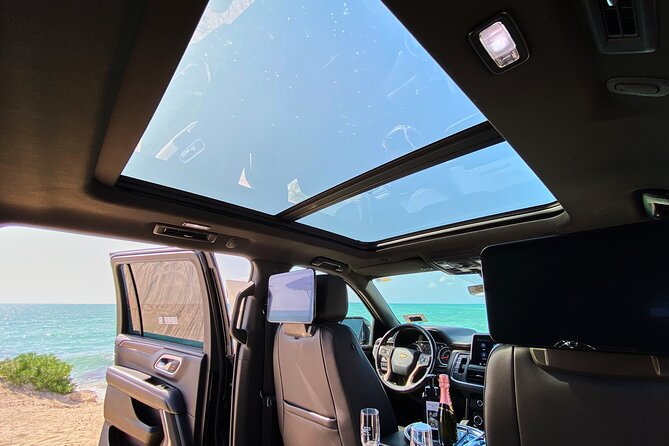 Luxury Suv departures from Tulum to Cancun Airport - The hotel lobby pickup in Tulum