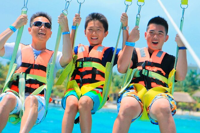 Parasailing & Beach Club with Transportation In Riviera Maya - What makes this family-friendly
