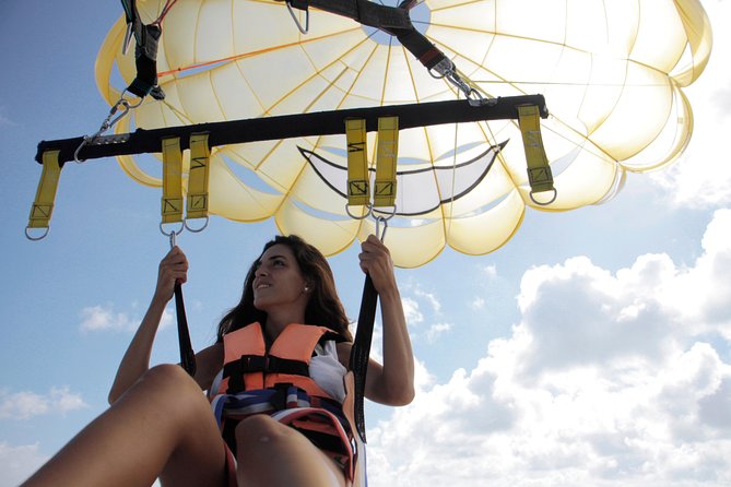 Parasailing in Playa del Carmen with transfer - Reaching Playa Maroma and preparing to fly
