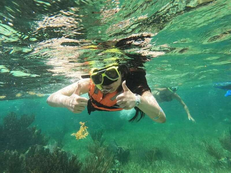 Puerto Morelos: Guided Snorkeling Tour with Gear & Fees - First reef stop: coral, fish, and time to look around
