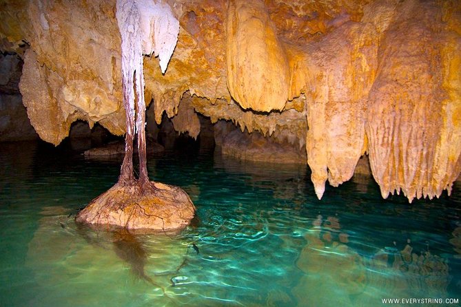 Silent Meditation in the Heart of the Cenote - Private groups - Entering the private cenote by flashlight