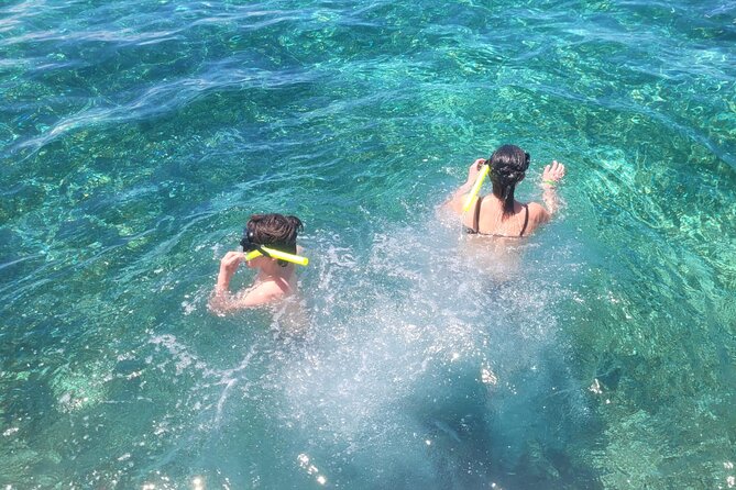 Tour to Cozumel by Catamaran with Snorkeling and Buffet Lunch - Cielito and the approach to Playa Mia